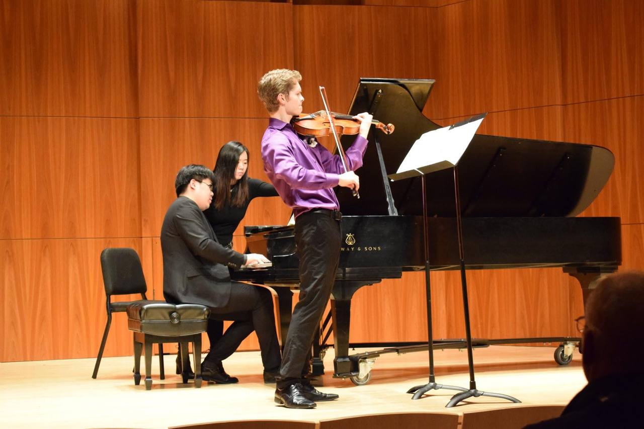 Matthew Eeuwes performing on stage